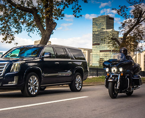 Тест Harley-Davidson FLHT и Cadillac Escalade: King Size